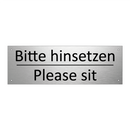 Bitte hinsetzen - Please sit