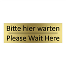 Bitte hier warten - Please Wait Here