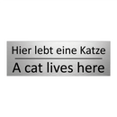 Hier lebt eine Katze - A cat lives here