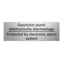 Geschützt durch elektronische /.../ - Protected by electronic alarm /.../