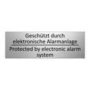 Geschützt durch elektronische /.../ - Protected by electronic alarm /.../