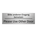 Bitte anderen Eingang benutzen - Please Use Other Door