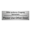 Bitte anderen Eingang benutzen - Please Use Other Door