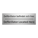 Defibrillator befindet sich hier /.../ - Defibrillator Located Here