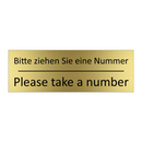 Bitte ziehen Sie eine Nummer - Please take a number