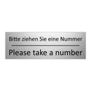 Bitte ziehen Sie eine Nummer - Please take a number