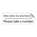 Bitte ziehen Sie eine Nummer - Please take a number