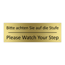 Bitte achten Sie auf die Stufe - Please Watch Your Step