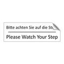 Bitte achten Sie auf die Stufe - Please Watch Your Step