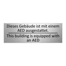 Dieses Gebäude ist mit einem AED /.../ - This building is equipped with /.../