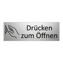 Drücken zum Öffnen