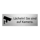 Lächeln! Sie sind auf Kamera.