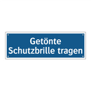 Getönte Schutzbrille tragen