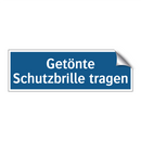 Getönte Schutzbrille tragen