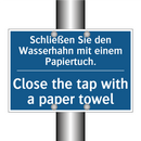 Schließen Sie den Wasserhahn mit /.../ - Close the tap with a paper towel/.../