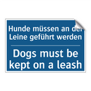 Hunde müssen an der Leine geführt /.../ - Dogs must be kept on a leash