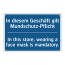 In diesem Geschäft gilt Mundschutz-Pflicht/.../ - In this store, wearing a face /.../