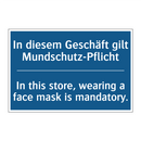 In diesem Geschäft gilt Mundschutz-Pflicht/.../ - In this store, wearing a face /.../