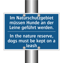 Im Naturschutzgebiet müssen Hunde /.../ - In the nature reserve, dogs must /.../