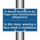 In diesem Geschäft ist das Tragen /.../ - In this store, wearing a face /.../