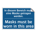In diesem Bereich muss eine Maske /.../ - Masks must be worn in this area/.../