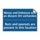 Nüsse und Erdnüsse sind an diesem /.../ - Nuts and peanuts are present in /.../