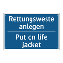 Rettungsweste anlegen - Put on life jacket