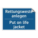 Rettungsweste anlegen - Put on life jacket