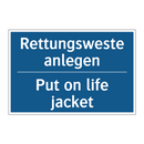 Rettungsweste anlegen - Put on life jacket