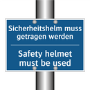 Sicherheitshelm muss getragen /.../ - Safety helmet must be used