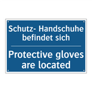Schutz- Handschuhe befindet sich/.../ - Protective gloves are located