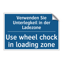 Verwenden Sie Unterlegkeil in /.../ - Use wheel chock in loading zone/.../