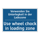 Verwenden Sie Unterlegkeil in /.../ - Use wheel chock in loading zone/.../