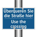 Überqueren Sie die Straße hier - Use the crossing