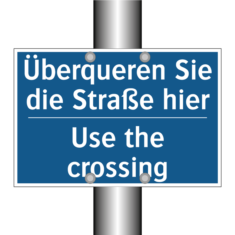 Überqueren Sie die Straße hier - Use the crossing