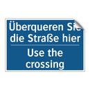Überqueren Sie die Straße hier - Use the crossing
