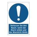 Verlassen Sie den Raum, wenn der Alarm ertönt und das Warnlicht blinkt.