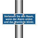 Verlassen Sie den Raum, wenn der Alarm ertönt und das Warnlicht blinkt.