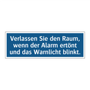Verlassen Sie den Raum, wenn der Alarm ertönt und das Warnlicht blinkt.