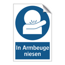 In Armbeuge niesen