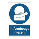 In Armbeuge niesen