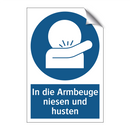In die Armbeuge niesen und husten