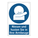 Niesen und husten Sie in Ihre Armbeuge