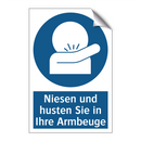 Niesen und husten Sie in Ihre Armbeuge
