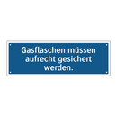 Gasflaschen müssen aufrecht gesichert werden.