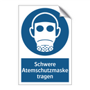 Schwere Atemschutzmaske tragen