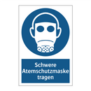 Schwere Atemschutzmaske tragen