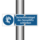 Sicherheitsbügel des Sessellifts schließen