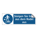 Steigen Sie links aus dem Rodel aus