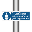 Gasflaschen müssen aufrecht gesichert werden.